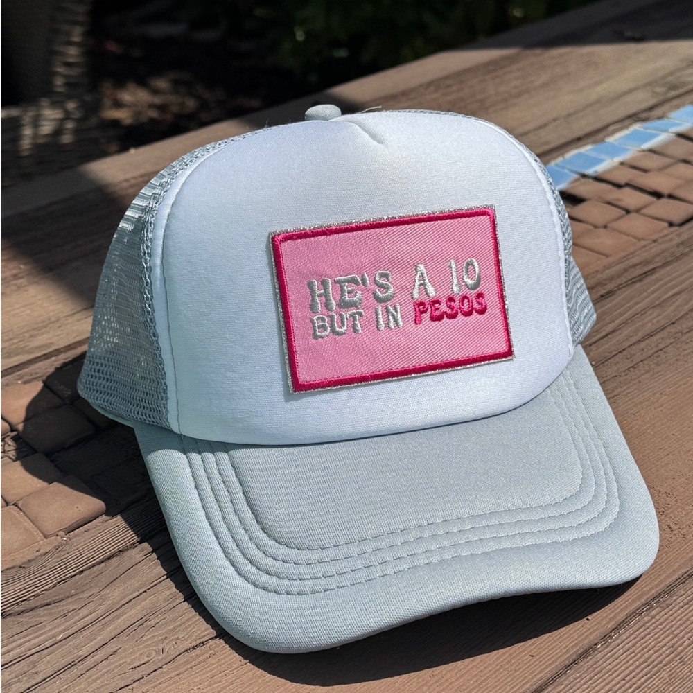 He’s a 10, but in Pesos Trucker Hat
